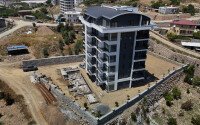 Affordable apartments with installment payment in a residential complex under construction, in a green, environmentally friendly area of Alanya - Demirtas-id-7301-photo-2