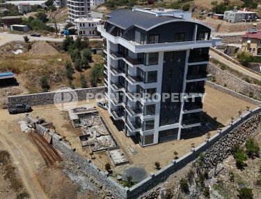 Affordable apartments with installment payment in a residential complex under construction, in a green, environmentally friendly area of Alanya - Demirtas-id-7301-photo-2