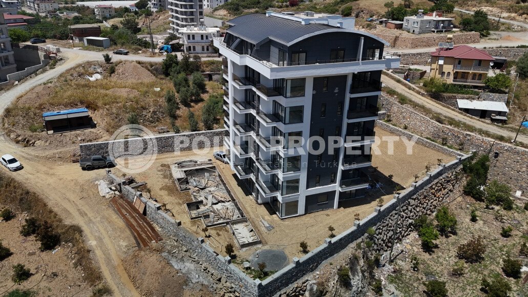 Affordable apartments with installment payment in a residential complex under construction, in a green, environmentally friendly area of Alanya - Demirtas-id-7301-photo-2