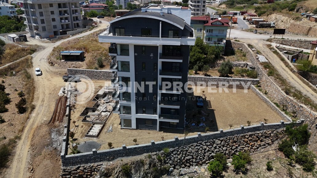 Affordable apartments with installment payment in a residential complex under construction, in a green, environmentally friendly area of Alanya - Demirtas-id-7301-photo-3