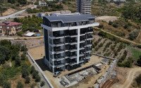 Affordable apartments with installment payment in a residential complex under construction, in a green, environmentally friendly area of Alanya - Demirtas-id-7301-photo-4