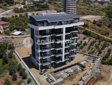 Affordable apartments with installment payment in a residential complex under construction, in a green, environmentally friendly area of Alanya - Demirtas-id-7301-photo-4