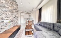 Stylish 1+1 apartment of 55 m² furnished in a residential complex of 2023 in Mahmutlar-id-9936-photo-2