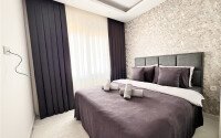 Stylish 1+1 apartment of 55 m² furnished in a residential complex of 2023 in Mahmutlar-id-9936-photo-3