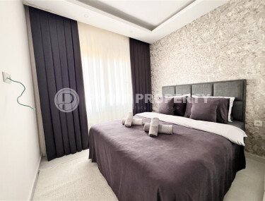 Стильная квартира 1+1 площадью 55 м² в меблированном виде в жилом комплексе 2023 года в районе Махмутлар-id-9936-фото-3