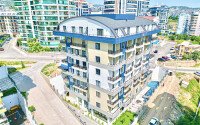 Stylish 1+1 apartment of 55 m² furnished in a residential complex of 2023 in Mahmutlar-id-9936-photo-6
