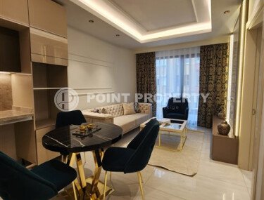 Стильная квартира 50 м² в районе Махмутлар в престижном комплексе на первой линии с частичным видом на море-id-9947-фото-3