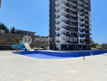 Cozy studio 33 m² in Mahmutlar area with furniture and mountain view-id-9949-photo-1