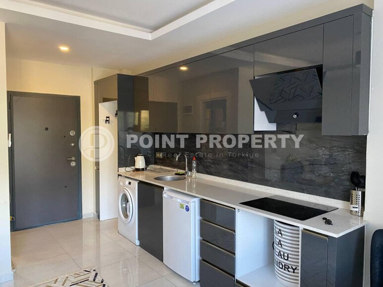 Cozy studio 33 m² in Mahmutlar area with furniture and mountain view-id-9949-photo-2