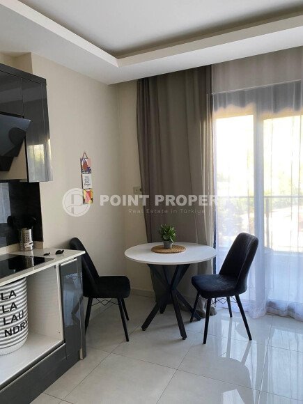 Cozy studio 33 m² in Mahmutlar area with furniture and mountain view-id-9949-photo-3