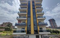Квартира 1+1 площадью 59 м² в спокойном районе Демирташ-id-9957-фото-1