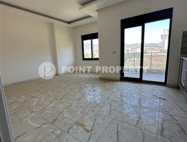 Квартира 1+1 площадью 59 м² в спокойном районе Демирташ-id-9957-фото-2