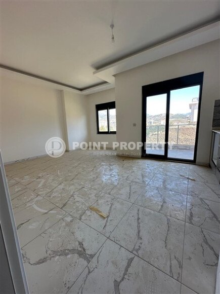 Квартира 1+1 площадью 59 м² в спокойном районе Демирташ-id-9957-фото-2