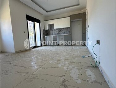 Квартира 1+1 площадью 59 м² в спокойном районе Демирташ-id-9957-фото-3