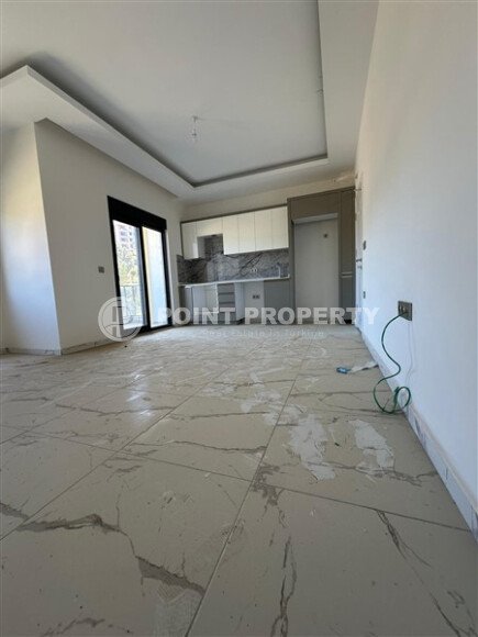 Квартира 1+1 площадью 59 м² в спокойном районе Демирташ-id-9957-фото-3