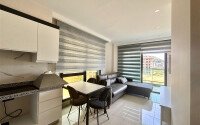 1+1 apartment 55 m² 100 meters from the sea in Kargicak-id-9958-photo-2