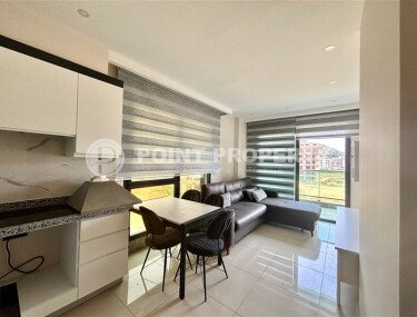 1+1 apartment 55 m² 100 meters from the sea in Kargicak-id-9958-photo-2