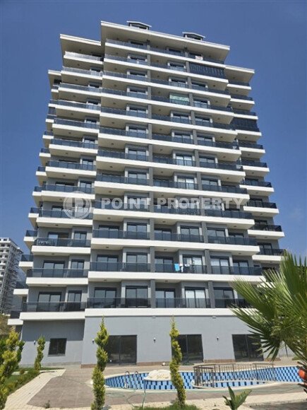 Modern apartment 50 m² in the Mahmutlar area in a new complex with a hammam and a water park-id-9959-photo-1