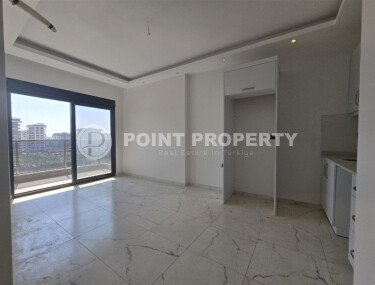 Современная квартира 50 м² в районе Махмутлар в новом комплексе с хамамом и аквапарком-id-9959-фото-2