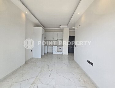 Современная квартира 50 м² в районе Махмутлар в новом комплексе с хамамом и аквапарком-id-9959-фото-3