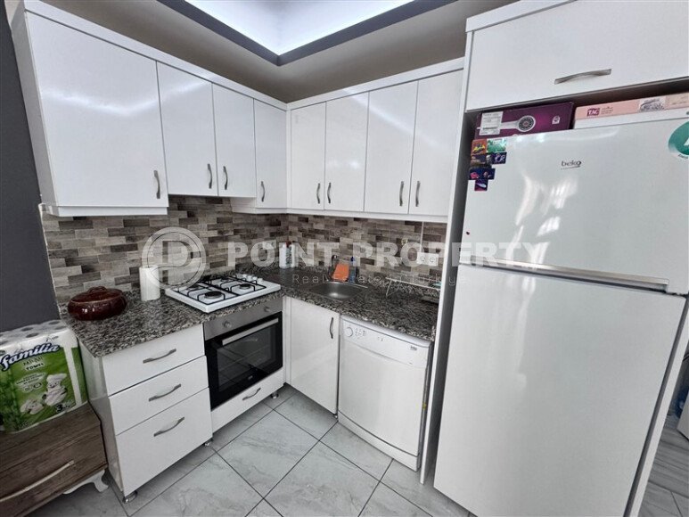 Уютная квартира 1+1 с интересной планировкой в круговом доме, район Махмутлар-id-9960-фото-2