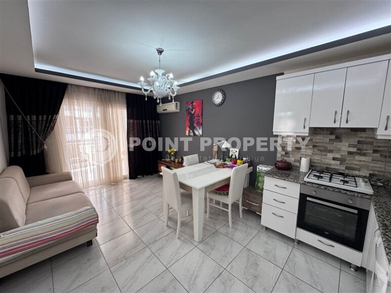 Уютная квартира 1+1 с интересной планировкой в круговом доме, район Махмутлар-id-9960-фото-3