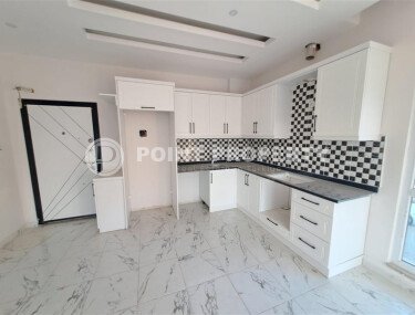 Современная квартира 1+1 площадью 55 м² в новом комплексе района Демирташ-id-9965-фото-2