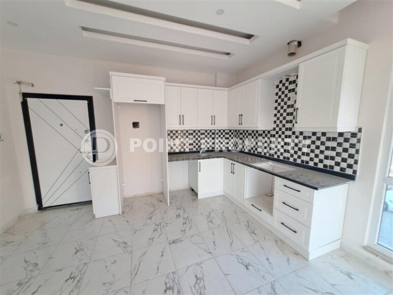 Современная квартира 1+1 площадью 55 м² в новом комплексе района Демирташ-id-9965-фото-2