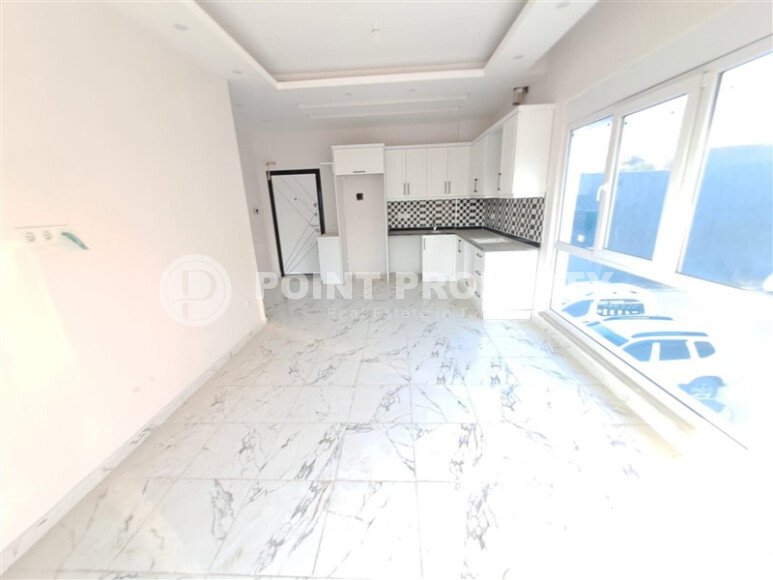 Современная квартира 1+1 площадью 55 м² в новом комплексе района Демирташ-id-9965-фото-3