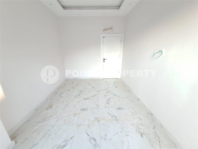 Современная квартира 1+1 площадью 55 м² в новом комплексе района Демирташ-id-9965-фото-4