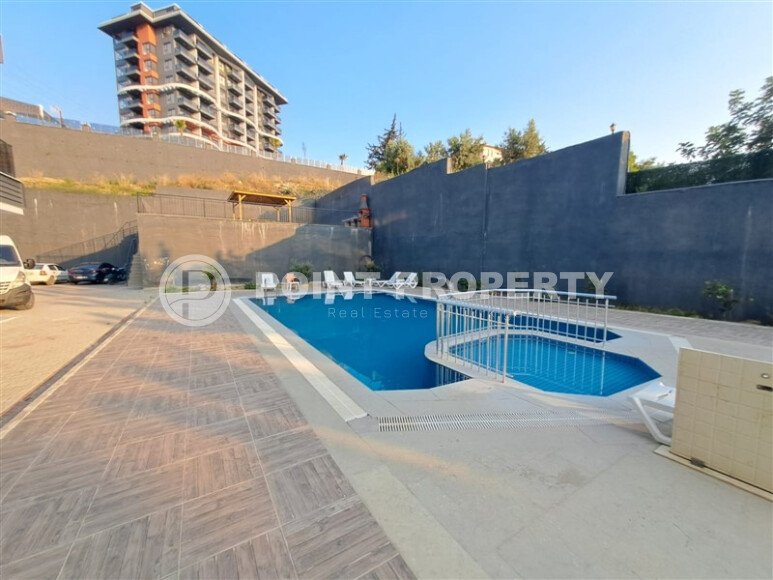 Современная квартира 1+1 площадью 55 м² в новом комплексе района Демирташ-id-9965-фото-7