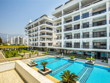 Просторный дуплекс 3+1 с панорамными окнами в районе Каргыджак подходит под  гражданство Турции.-id-9968-фото-1