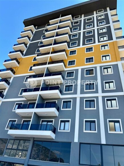 Квартира 1+1 с видом на горы, 59 м², современный комплекс в Махмутларе-id-9969-фото-9