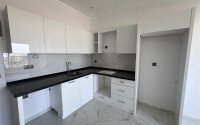 Квартира 1+1 с видом на горы, 59 м², современный комплекс в Махмутларе-id-9969-фото-2