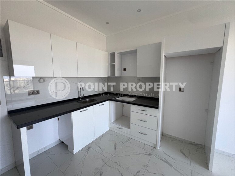 Квартира 1+1 с видом на горы, 59 м², современный комплекс в Махмутларе-id-9969-фото-2