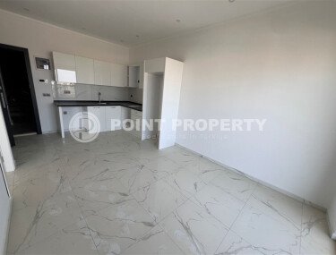 Квартира 1+1 с видом на горы, 59 м², современный комплекс в Махмутларе-id-9969-фото-4