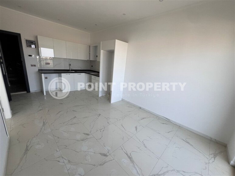 Квартира 1+1 с видом на горы, 59 м², современный комплекс в Махмутларе-id-9969-фото-4