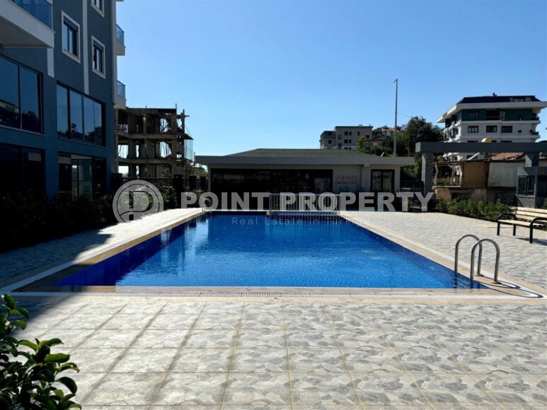 Квартира 1+1 с видом на горы, 59 м², современный комплекс в Махмутларе-id-9969-фото-6