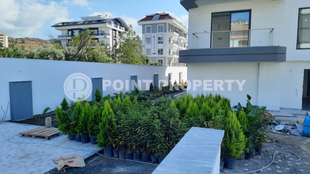 Небольшая двухкомнатная квартира в новом комплексе на финишной стадии строительства, Демирташ, Аланья-id-3353-фото-5