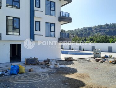 Небольшая двухкомнатная квартира в новом комплексе на финишной стадии строительства, Демирташ, Аланья-id-3353-фото-3