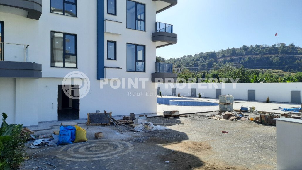 Небольшая двухкомнатная квартира в новом комплексе на финишной стадии строительства, Демирташ, Аланья-id-3353-фото-3