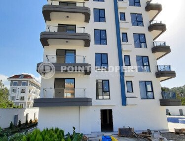 Небольшая двухкомнатная квартира в новом комплексе на финишной стадии строительства, Демирташ, Аланья-id-3353-фото-2