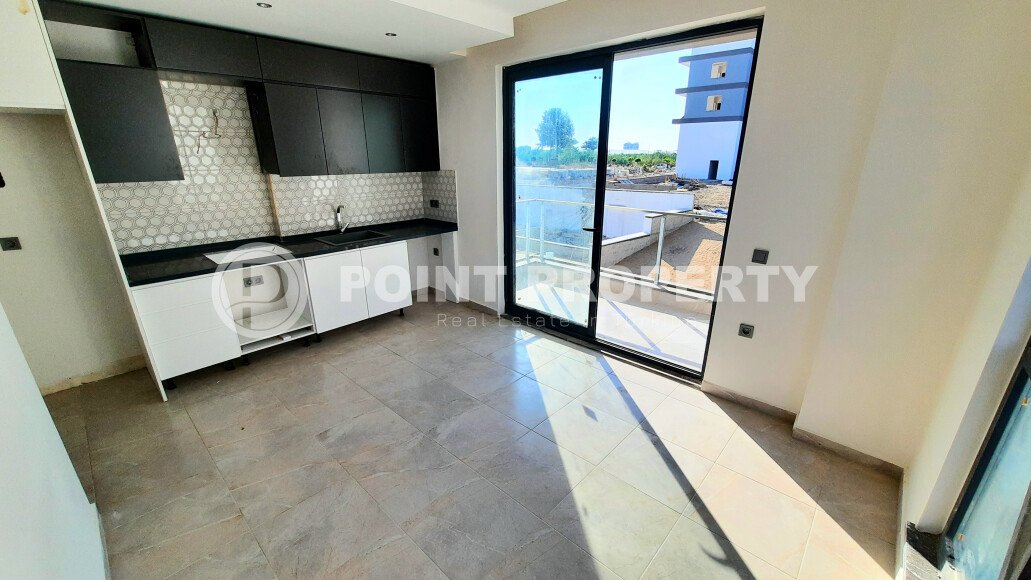 Небольшая двухкомнатная квартира в новом комплексе на финишной стадии строительства, Демирташ, Аланья-id-3353-фото-7