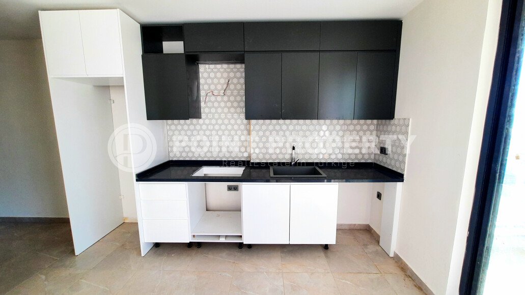 Небольшая двухкомнатная квартира в новом комплексе на финишной стадии строительства, Демирташ, Аланья-id-3353-фото-9