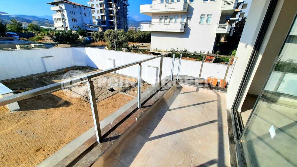 Небольшая двухкомнатная квартира в новом комплексе на финишной стадии строительства, Демирташ, Аланья-id-3353-фото-15