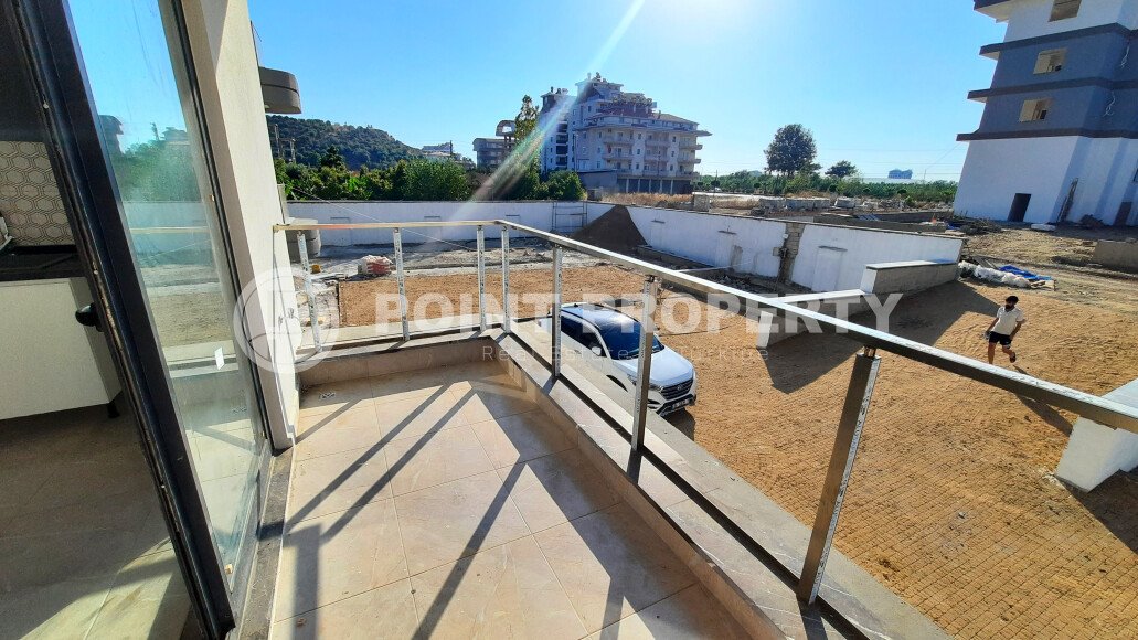 Небольшая двухкомнатная квартира в новом комплексе на финишной стадии строительства, Демирташ, Аланья-id-3353-фото-16