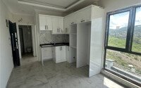 Квартира 50 м² в районе Демирташ в современном комплексе-id-9404-фото-7