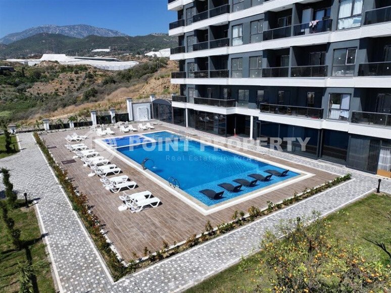 Квартира 50 м² в районе Демирташ в современном комплексе-id-9404-фото-18