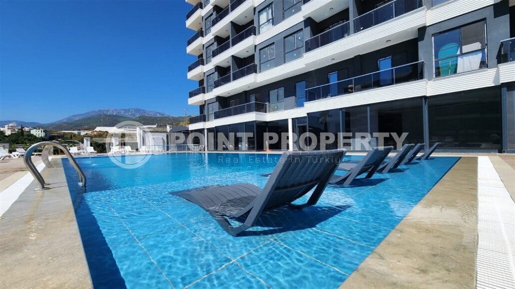 Квартира 50 м² в районе Демирташ в современном комплексе-id-9404-фото-22