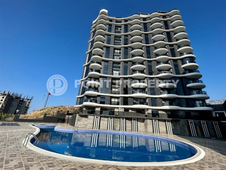 Modern 2+1 apartment with sea view and infinity pool on the roof in Mahmutlar-id-9973-photo-1